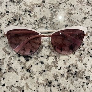 White rimmed sunglasses